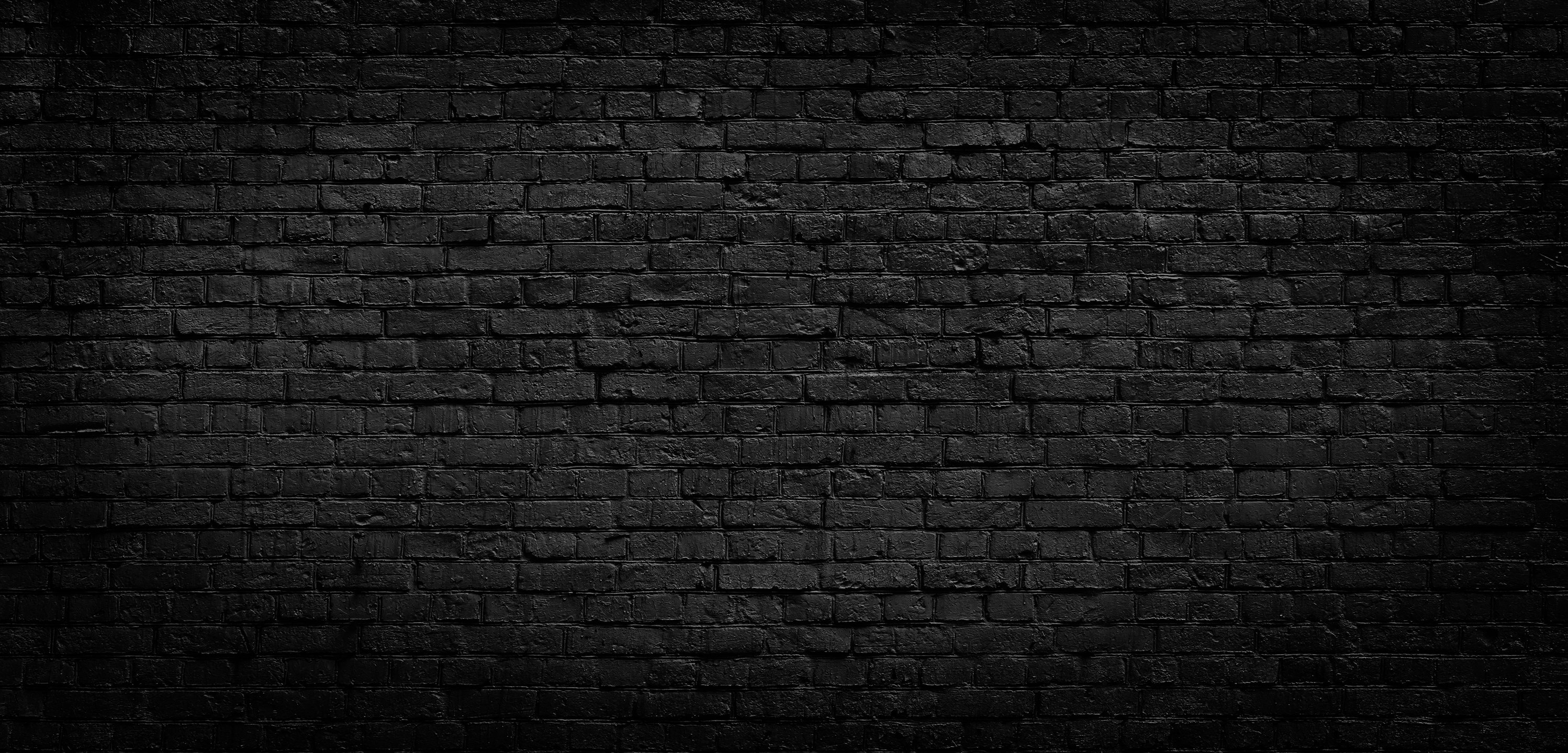 Old Black Brick Wall Background