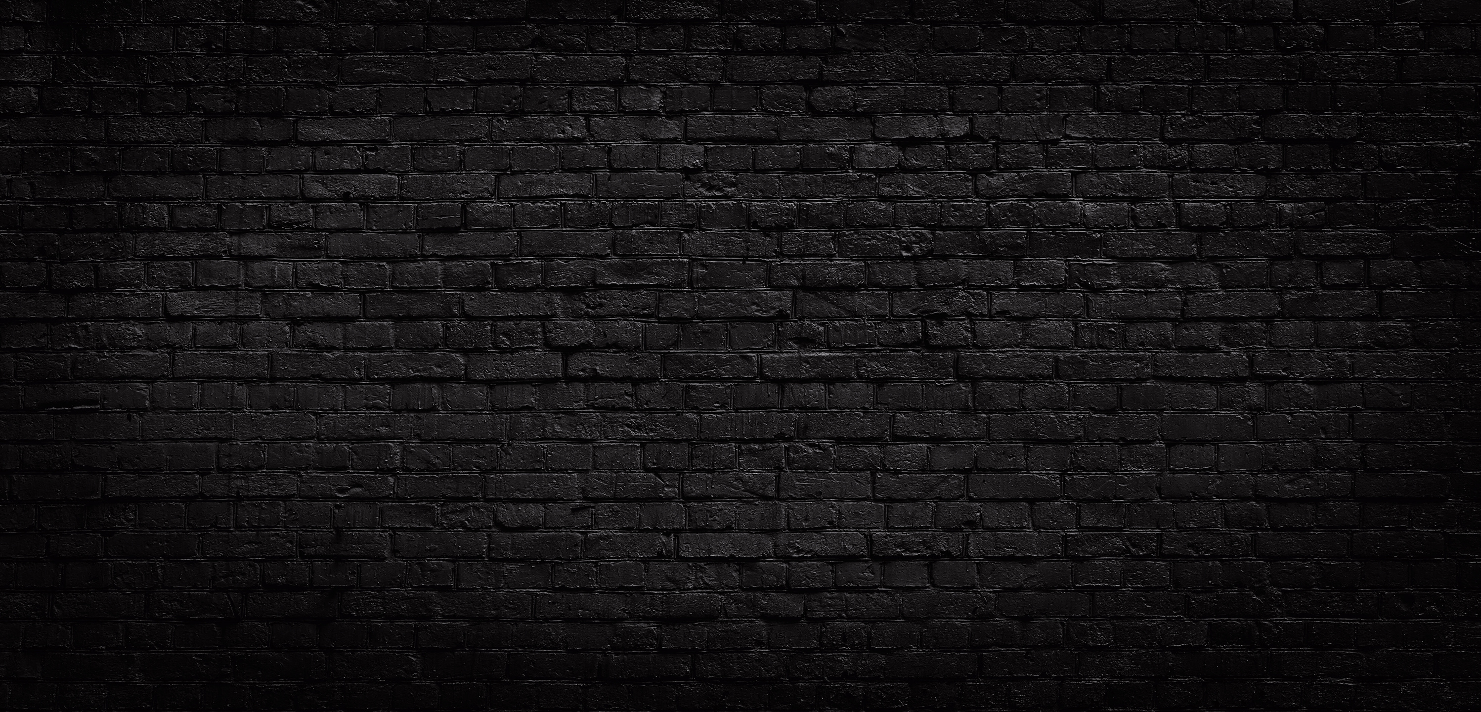 Old Black Brick Wall Background