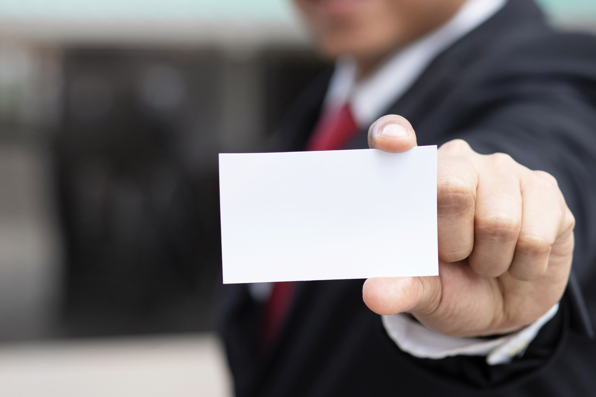 Businessman Holding a Business Card